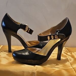 Elegant Black Heels with Gold Accents
